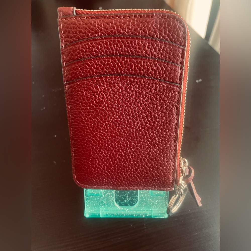KATE SPADE
Burgundy
Leather
6 Card holder
with zipper pocket
NEW - Picture 4 of 6